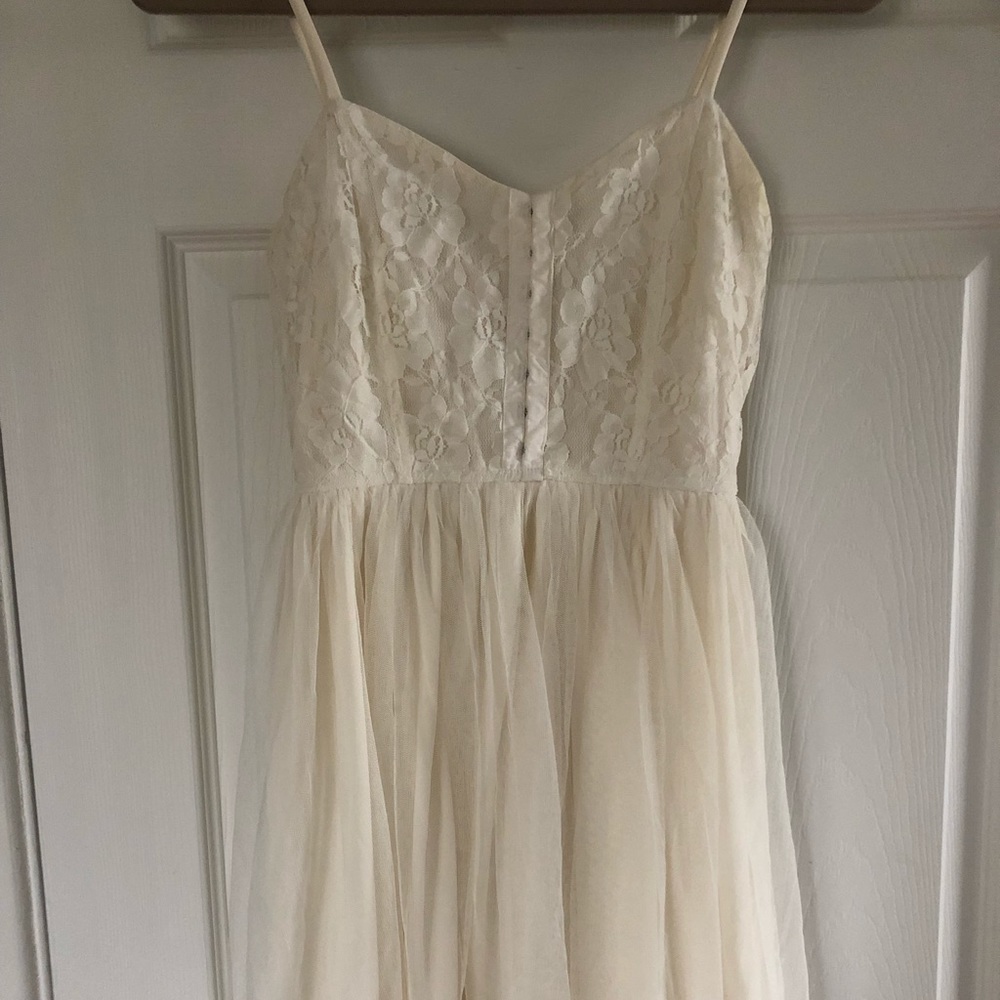 White tool and lace dress from Urban Outfitters